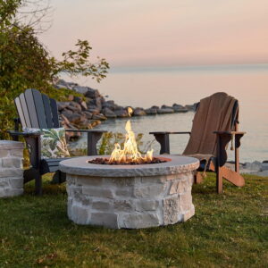 Real Flame Scottsdale 40" Round Stone Propane Fire Pit Table in Beige
